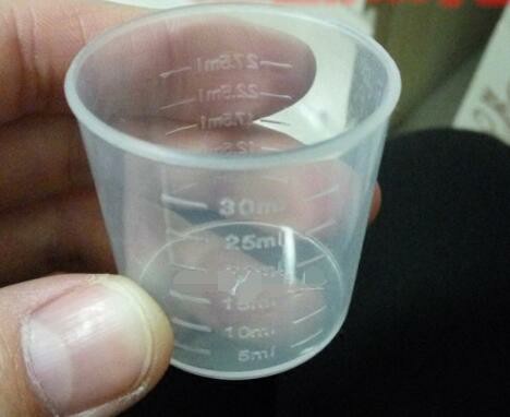 vasos de medicina de plástico